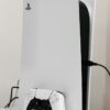white playstation five console and controller