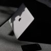 iPhone beside MacBook